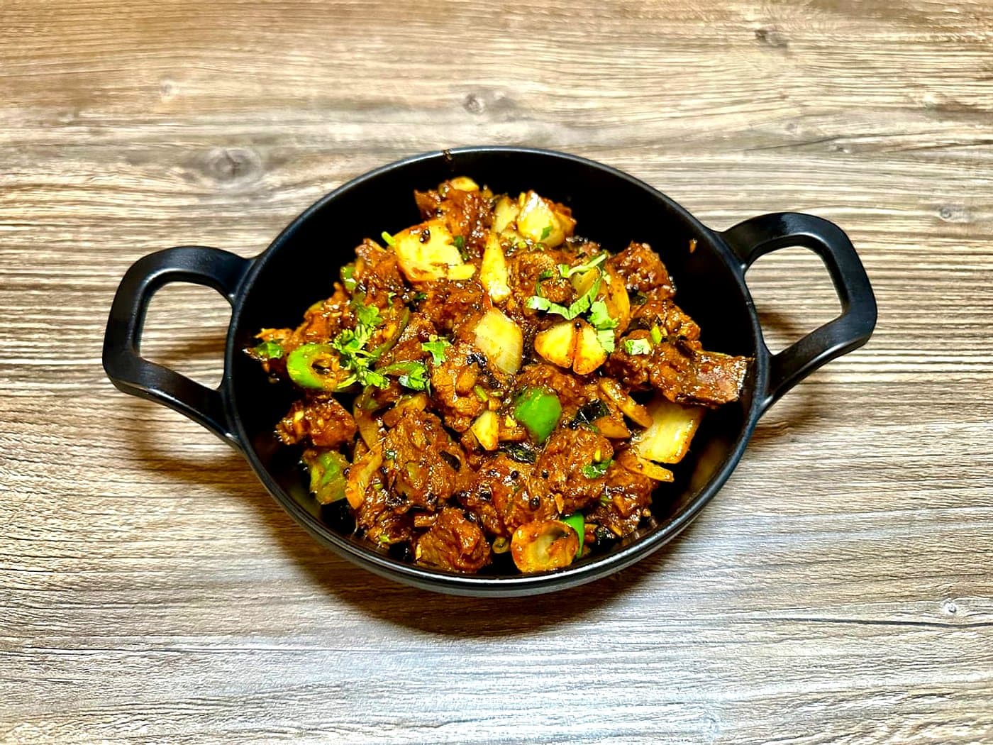 Mutton Bone-In Curry Las Vegas — Mint Indian Bistro signature dish