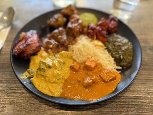 Plated Indian meal at Mint Indian Bistro Flamingo